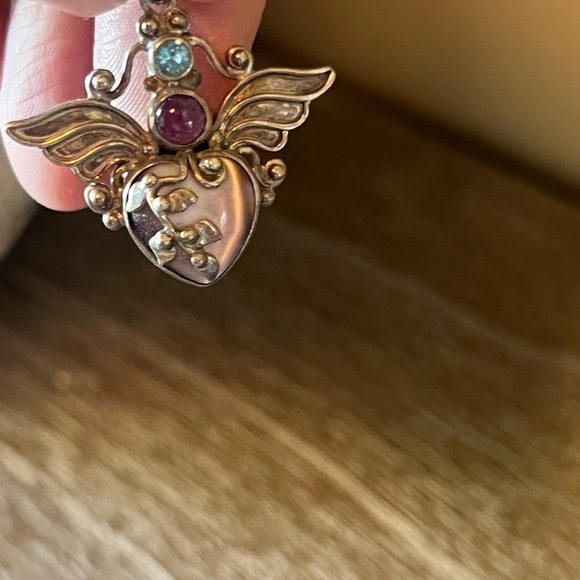 Jewelry - Heart with wings sterling silver pendant